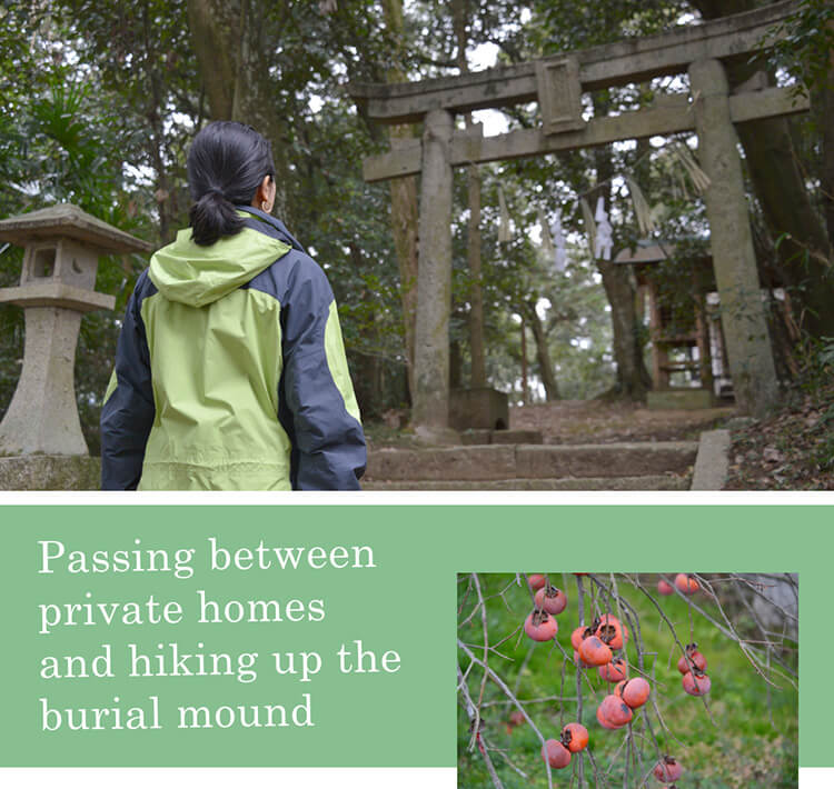 Passing between private homes and hiking up the burial mound